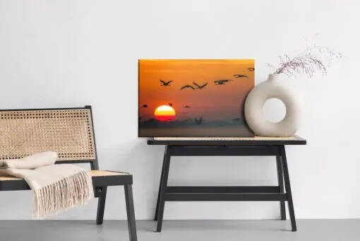 Leinwandbild Fliegende Kraniche