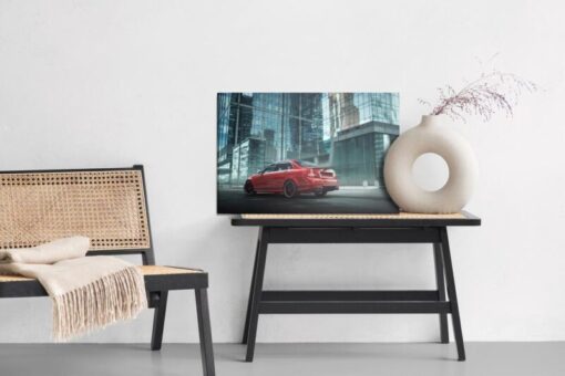 Leinwandbild Rotes Auto In Der Stadt