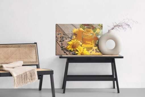Leinwandbild Sonnenblumenöl Mit Blüten